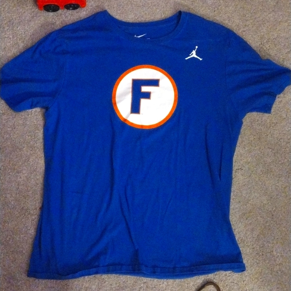 blue Nike shirt